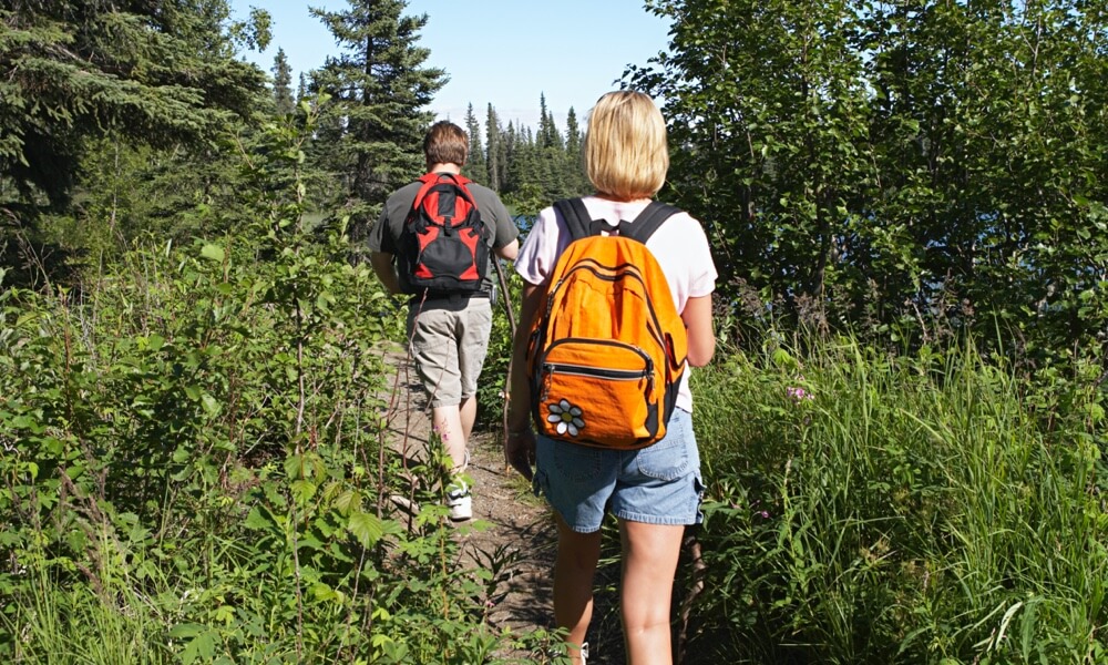 girl carrying backpack